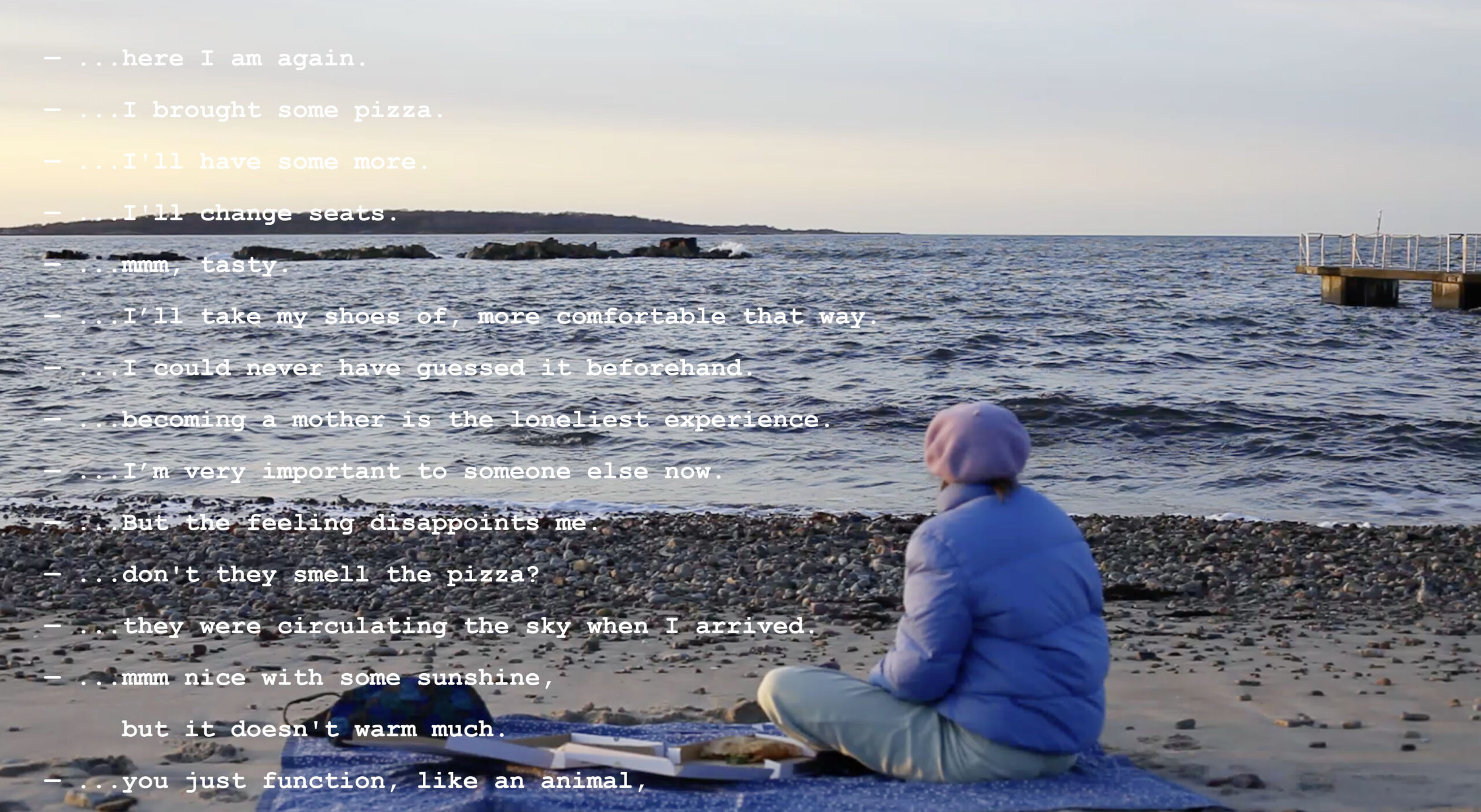 filmstill of person sitting on a beach looking out on the ocean. Text is written over the image.